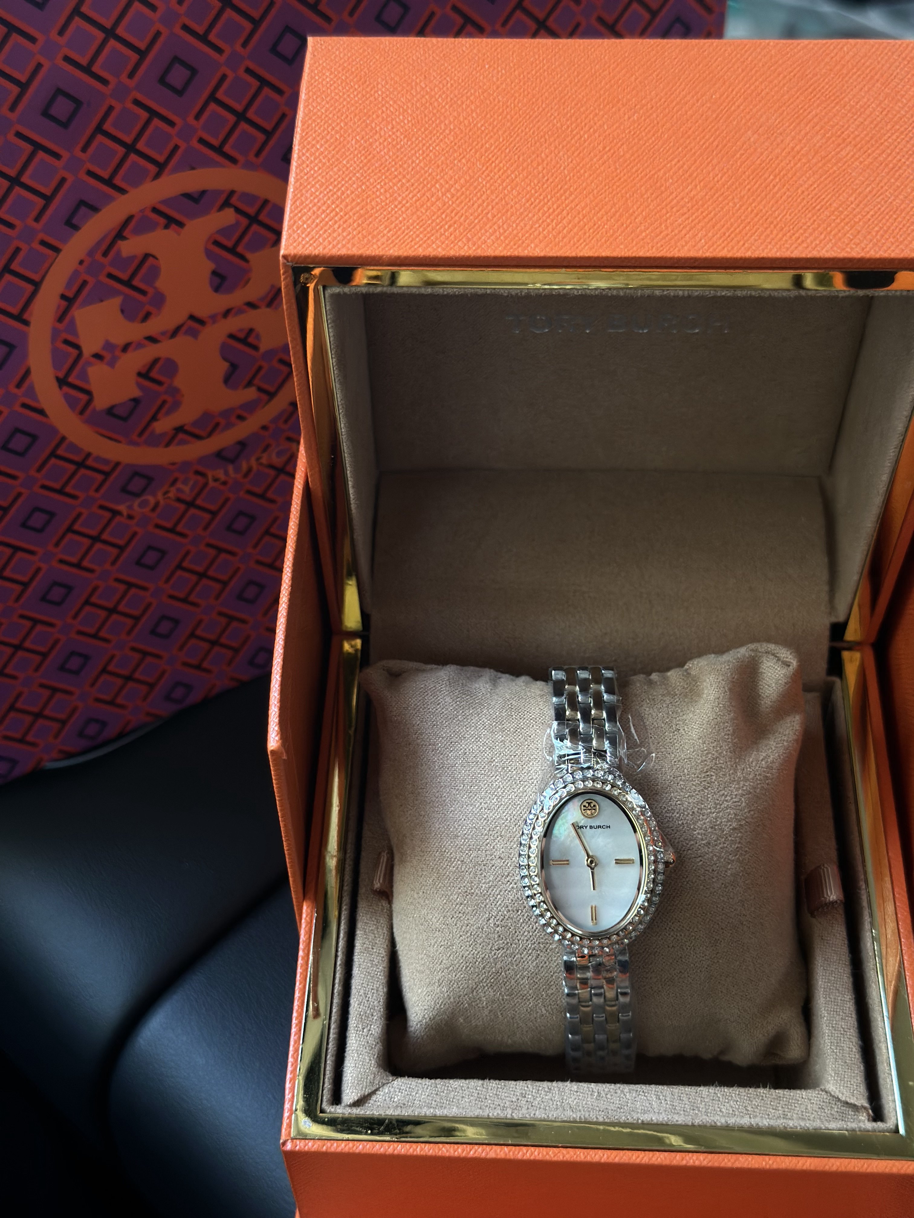 ساعة Tory Burch Oval Gold & Silver
